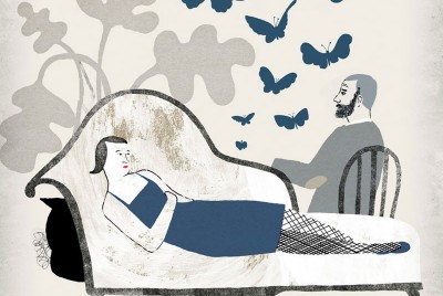  θεραπευόμενη κάθεται σε ανάκλινδρο καναπέ σε συνεδρία με θεραευτή
